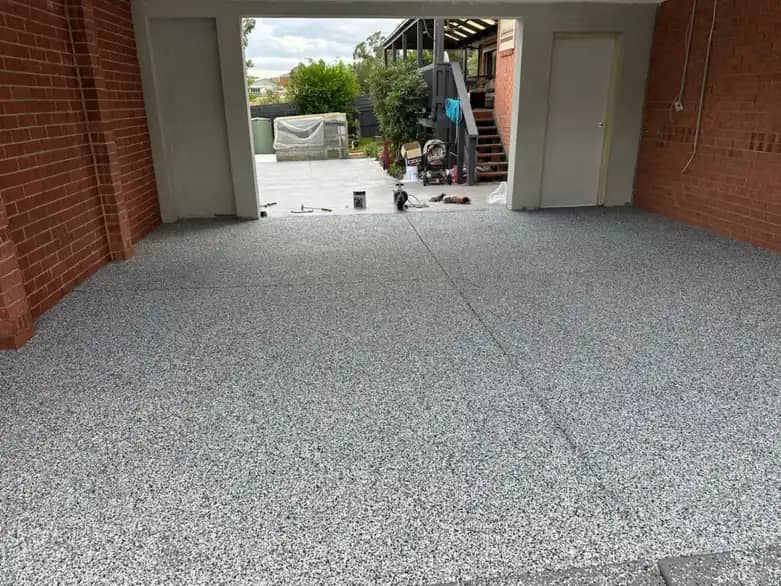 Professional garage floor coating project completed with durable and clean surface finish.