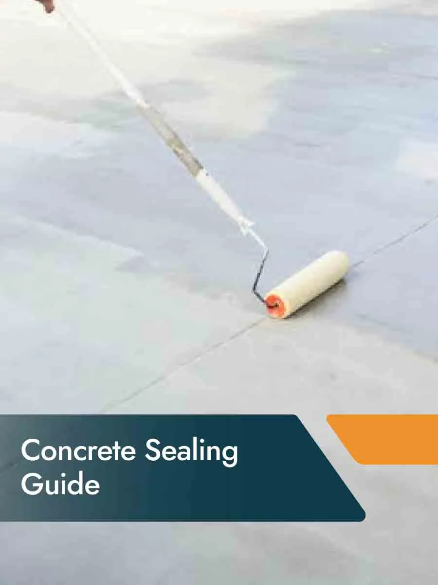 Applying concrete sealer to a driveway for long-lasting protection and durability.