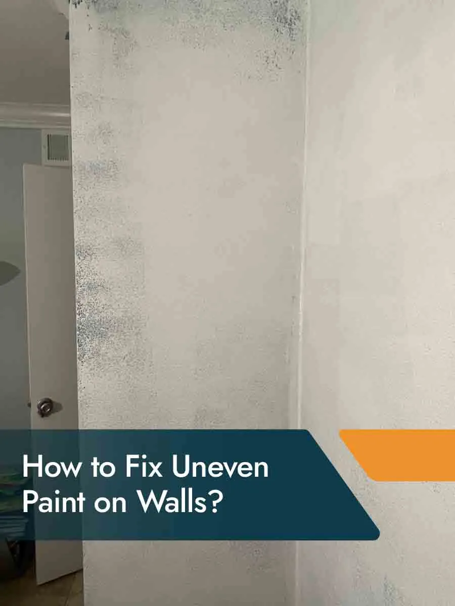 Painter smoothing uneven paint on a wall using a roller for a flawless finish.