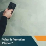 Venetian plaster finish creating a smooth, polished wall with a luxurious marble-like appearance.