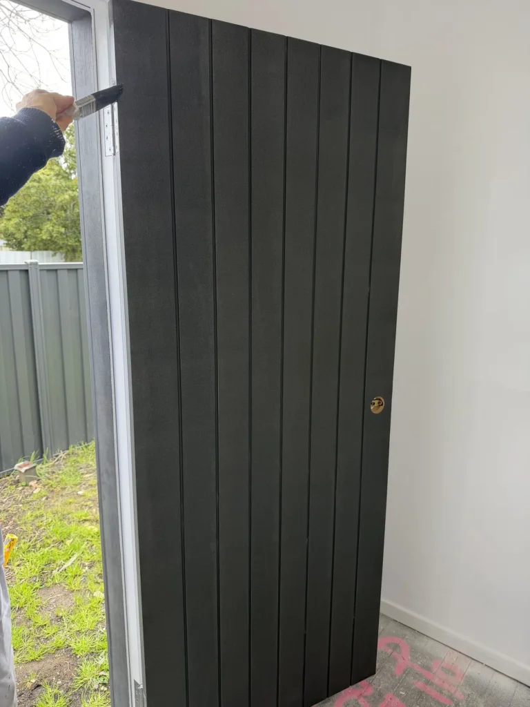 Timber door painted black – door painting by Ace Coating Services Melbourne